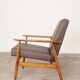 Brown vegan leather vintage armchair with modern design.