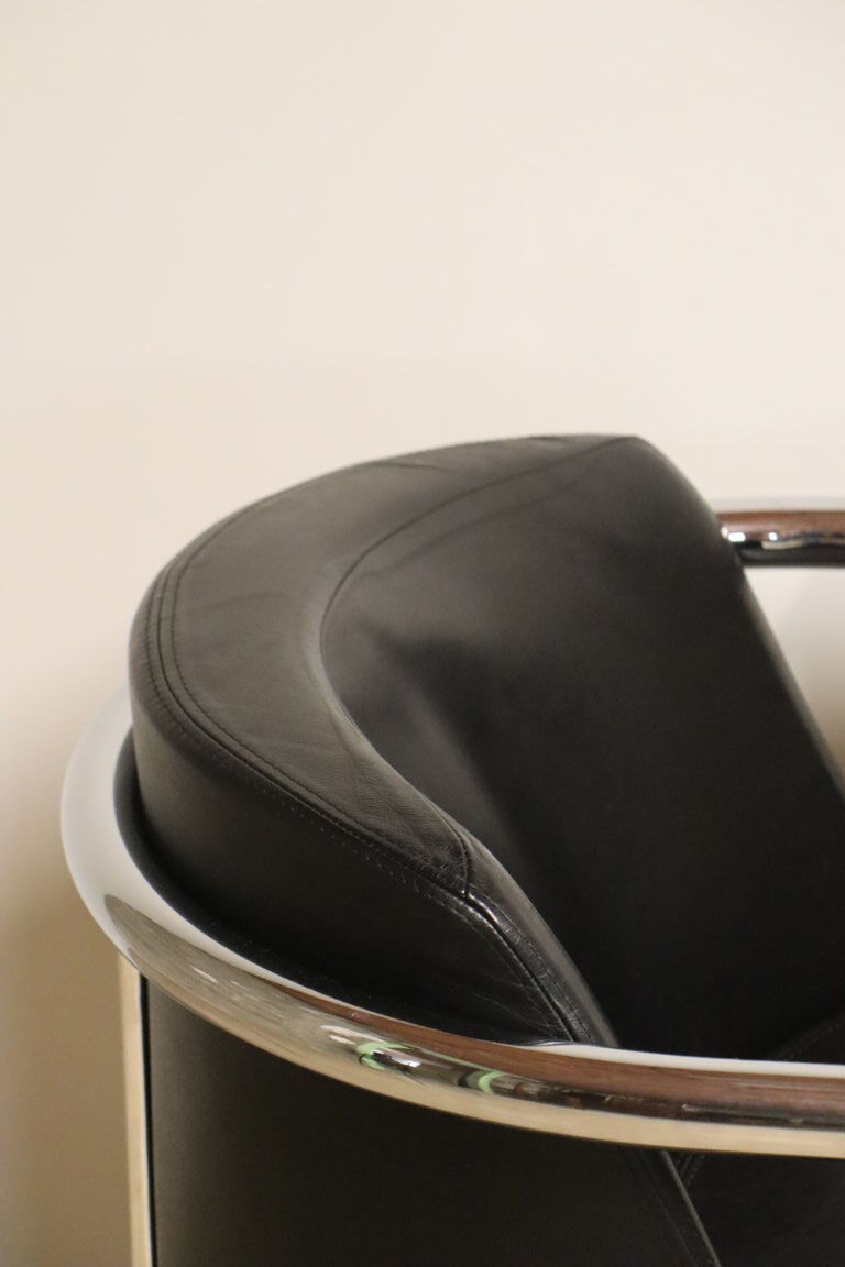 Pair of armchairs in synthetic leather and chromed metal, 1970