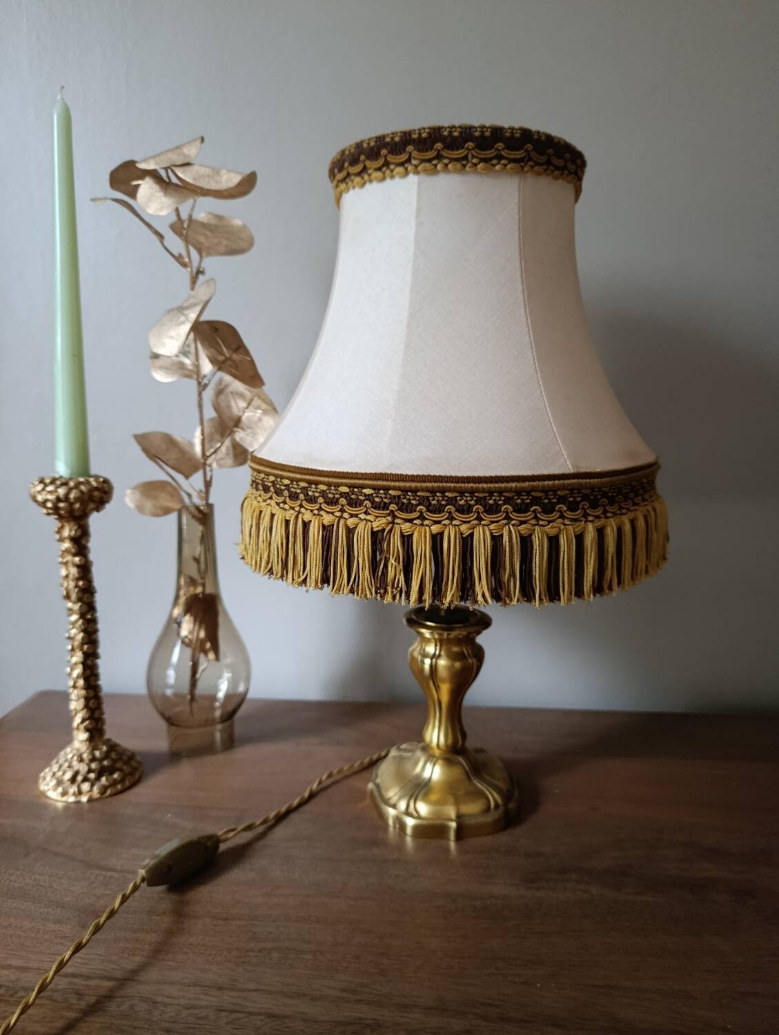 Chic retro lamp with a bronze pagoda fringe shade, 1950.