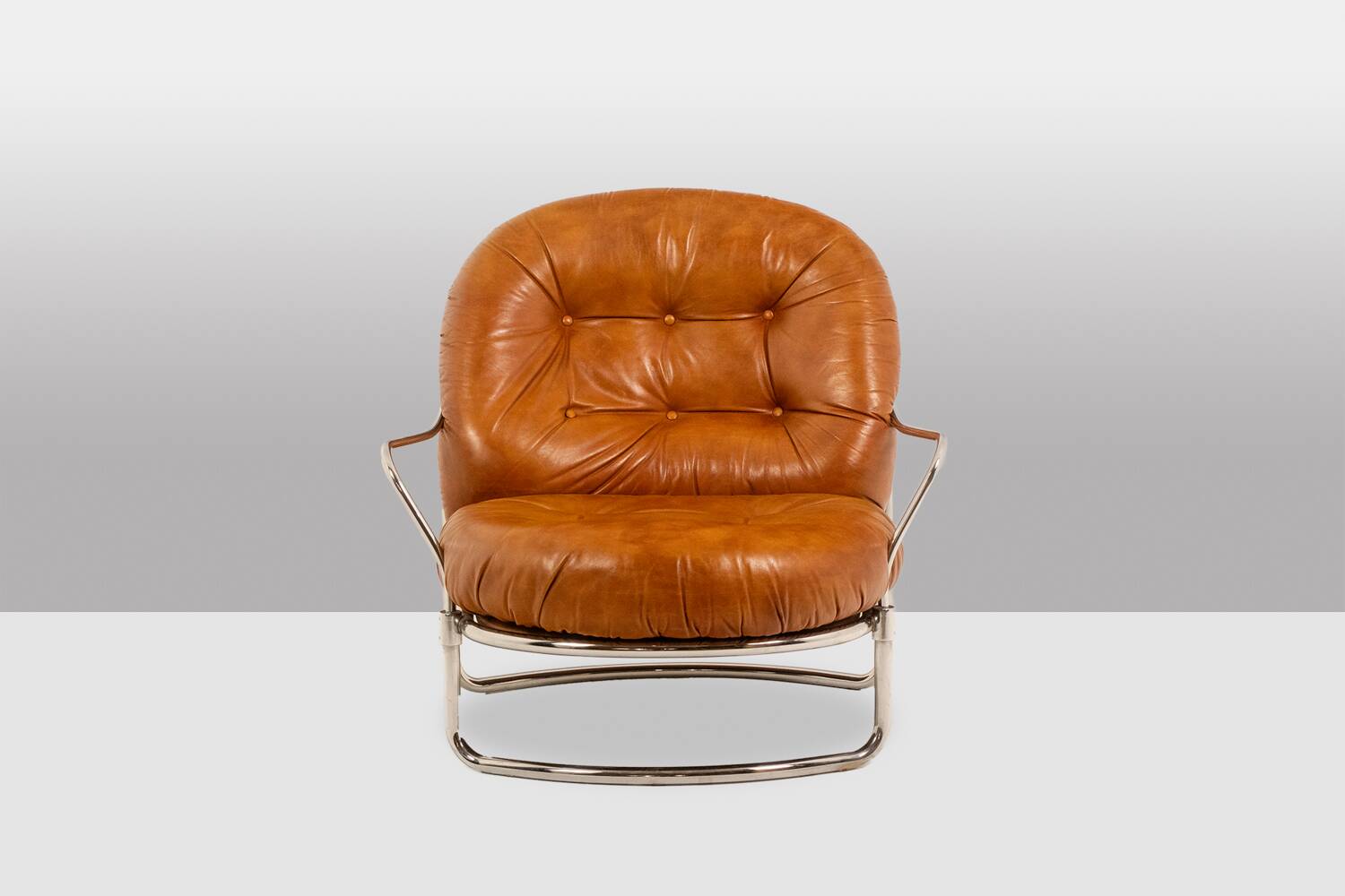 Carlo Di Carli. Leather and metal armchair. 1970s.