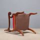 Antique Restoration-style armchair in walnut, fabric, Italy, 19th century.