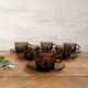 Six smoked glass coffee cups