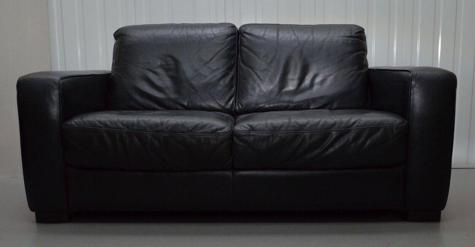 2-seater leather Natuzzi sofa with armchair