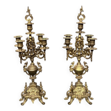 Pair of Renaissance style candlesticks. Solid bronze.