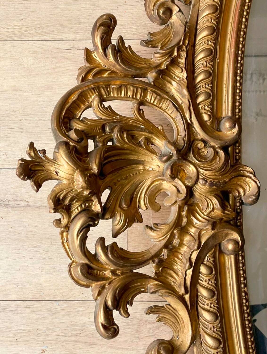 Large wooden and gilded stucco mirror with parecloses - 19th century