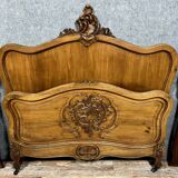 Louis XV Rocaille center bed in walnut circa 1880