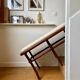 Wooden and beige cotton piano bench