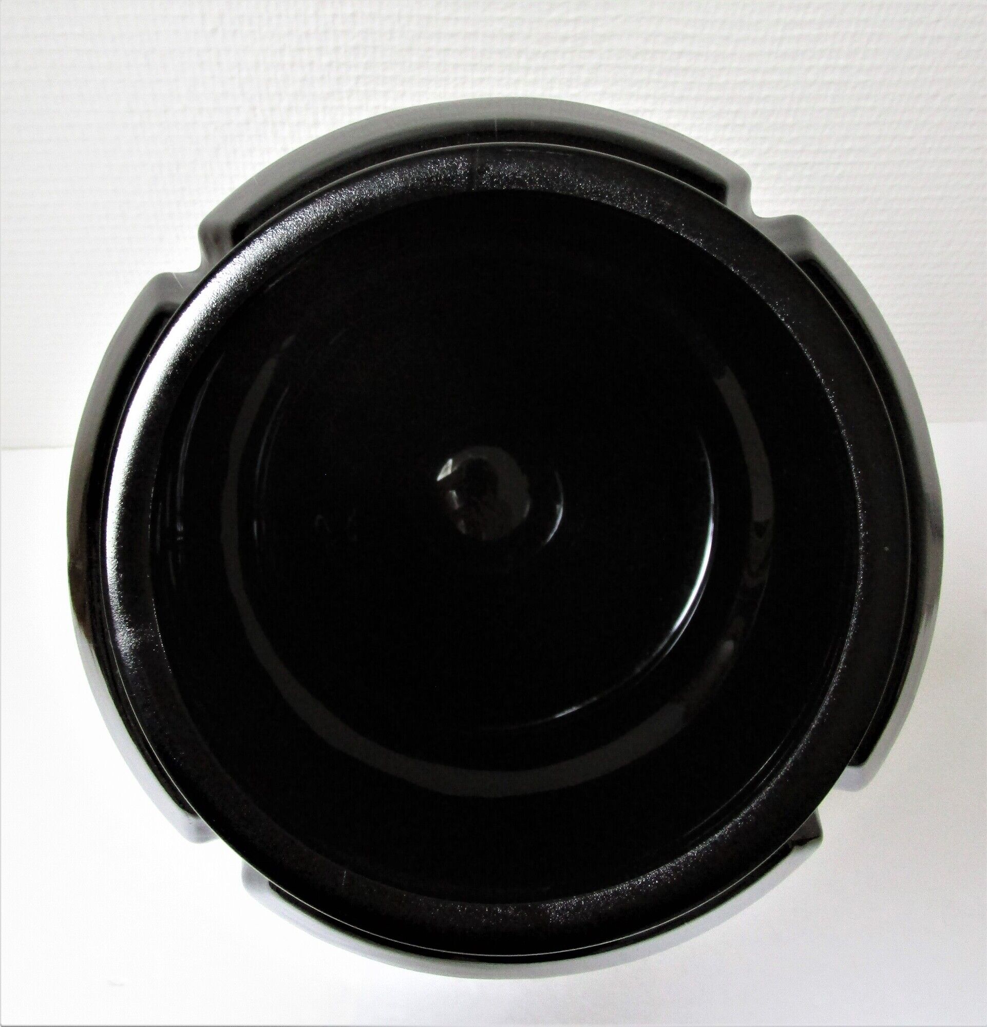 Champagne bucket design black glass in the shape of a 70s cork