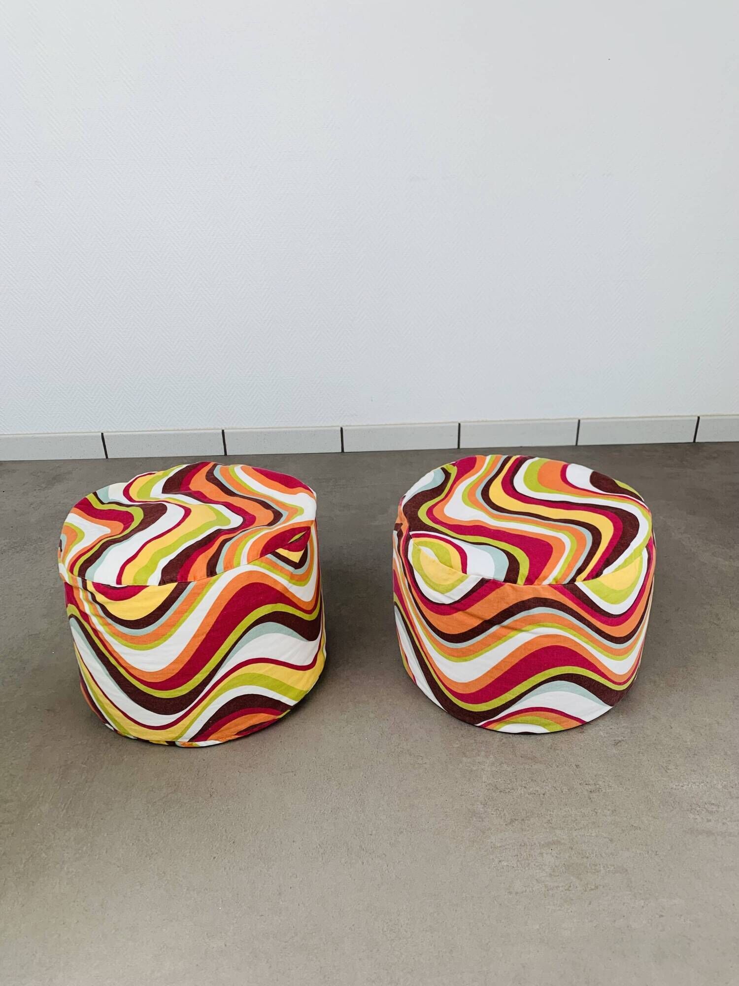 Pair of "psychedelic" fabric poufs from the 70s.