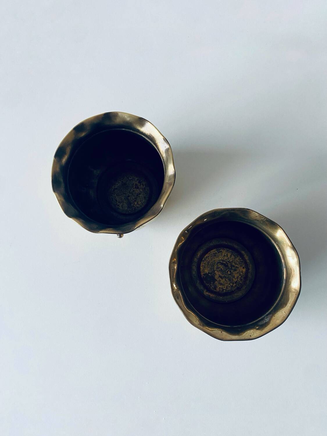 Pair of brass cord pot covers