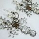 Paire de appliques en cristal et bronze Maison Bagues, années 1960.