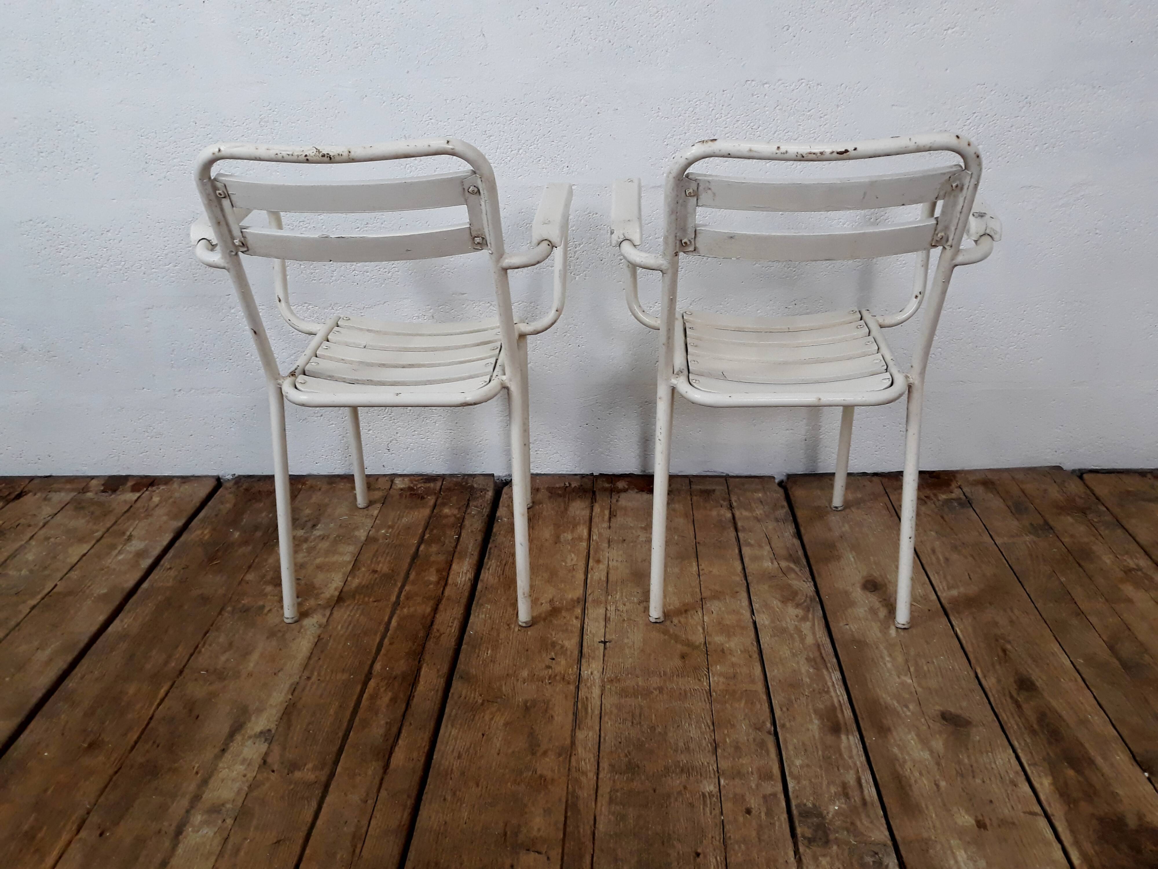 4 chairs and armchairs by Tolix