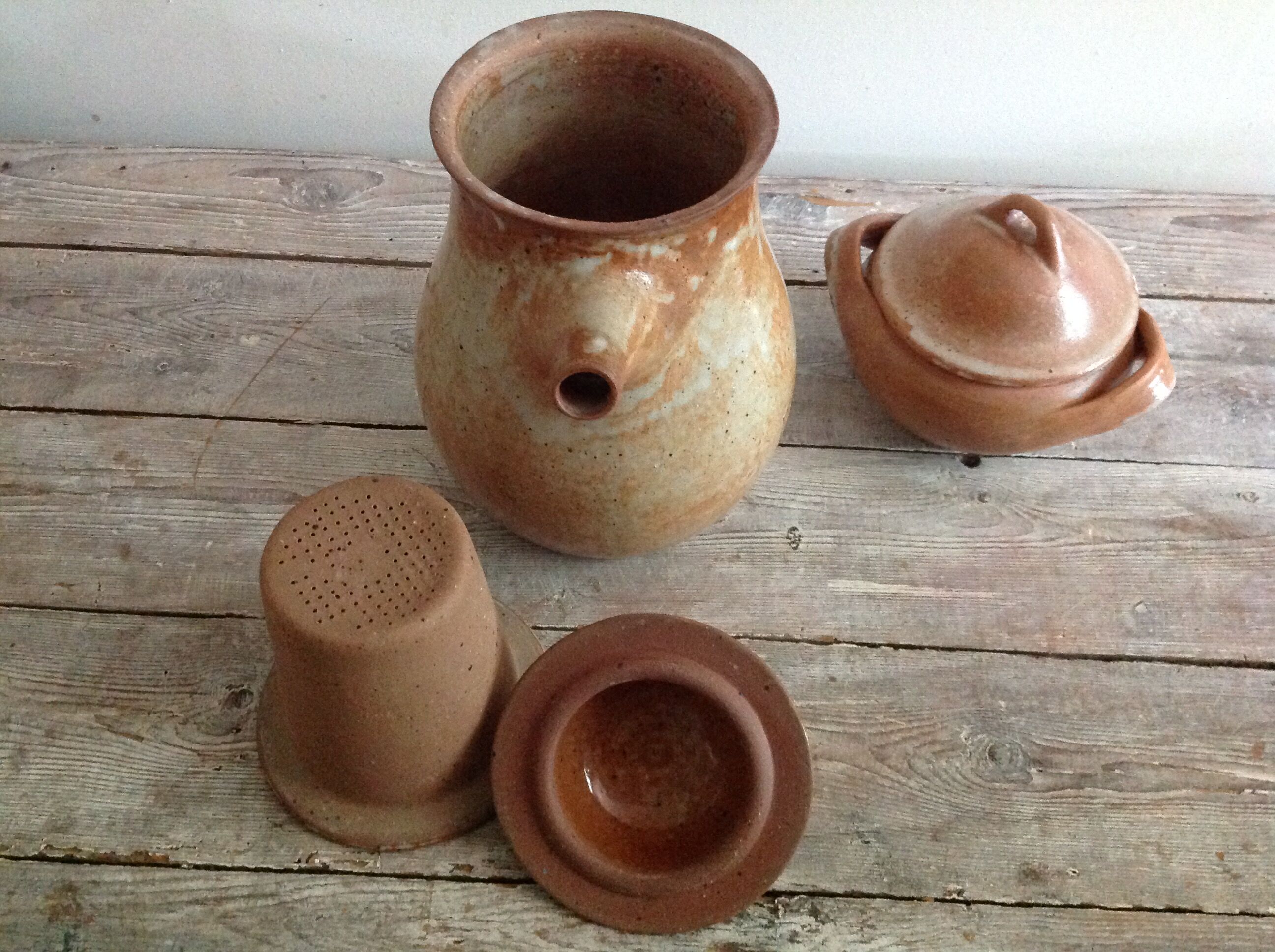 Teapot in reeds and its sugar bowl
