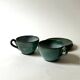 Handmade and signed glazed ceramic coffee cups, circa 1950.