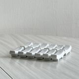 12 chopstick rests, white porcelain knife rests.