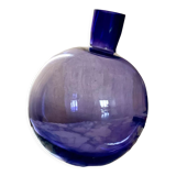 Purple vase inclined