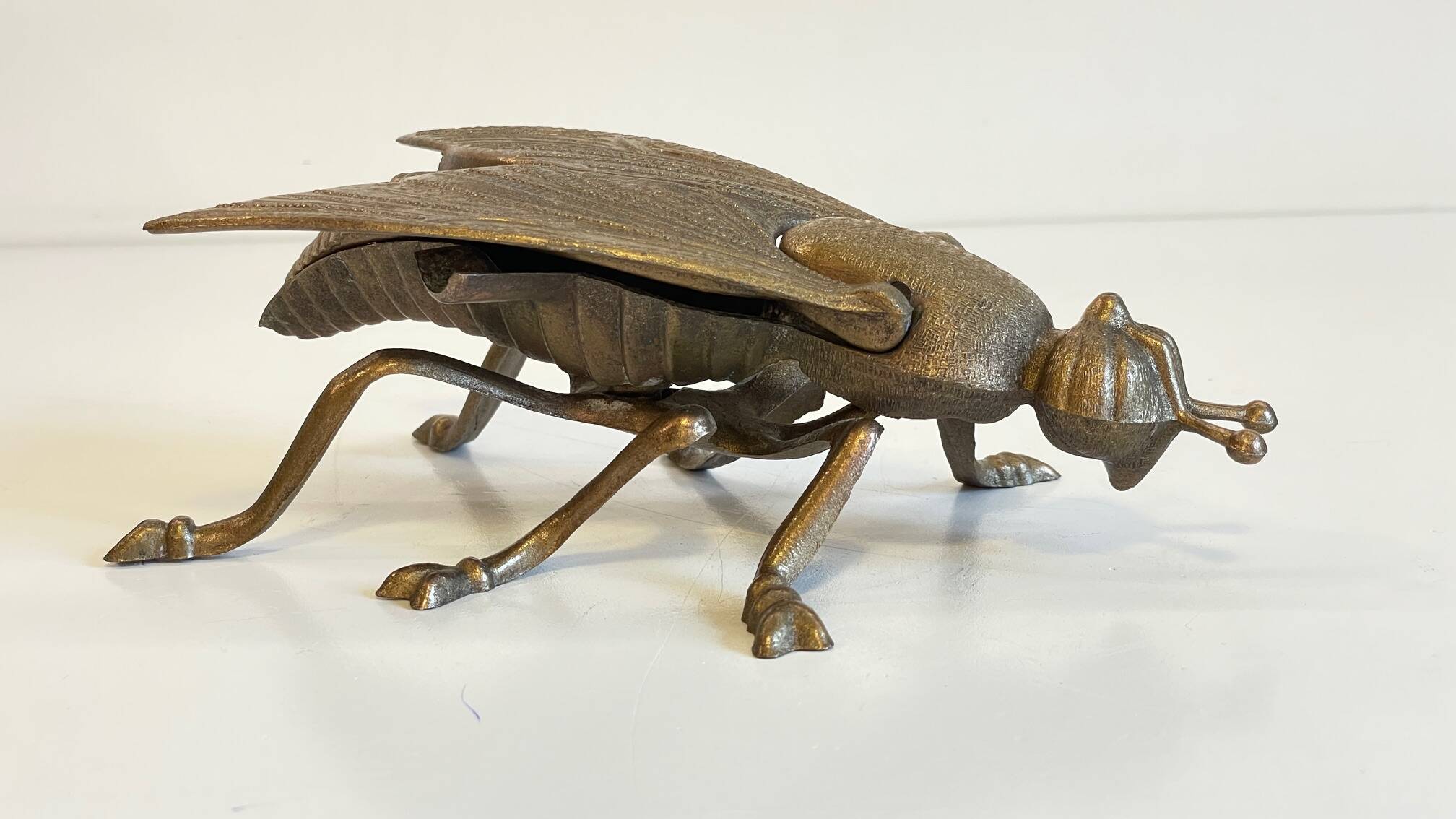 Vintage fly ashtray in patinated metal