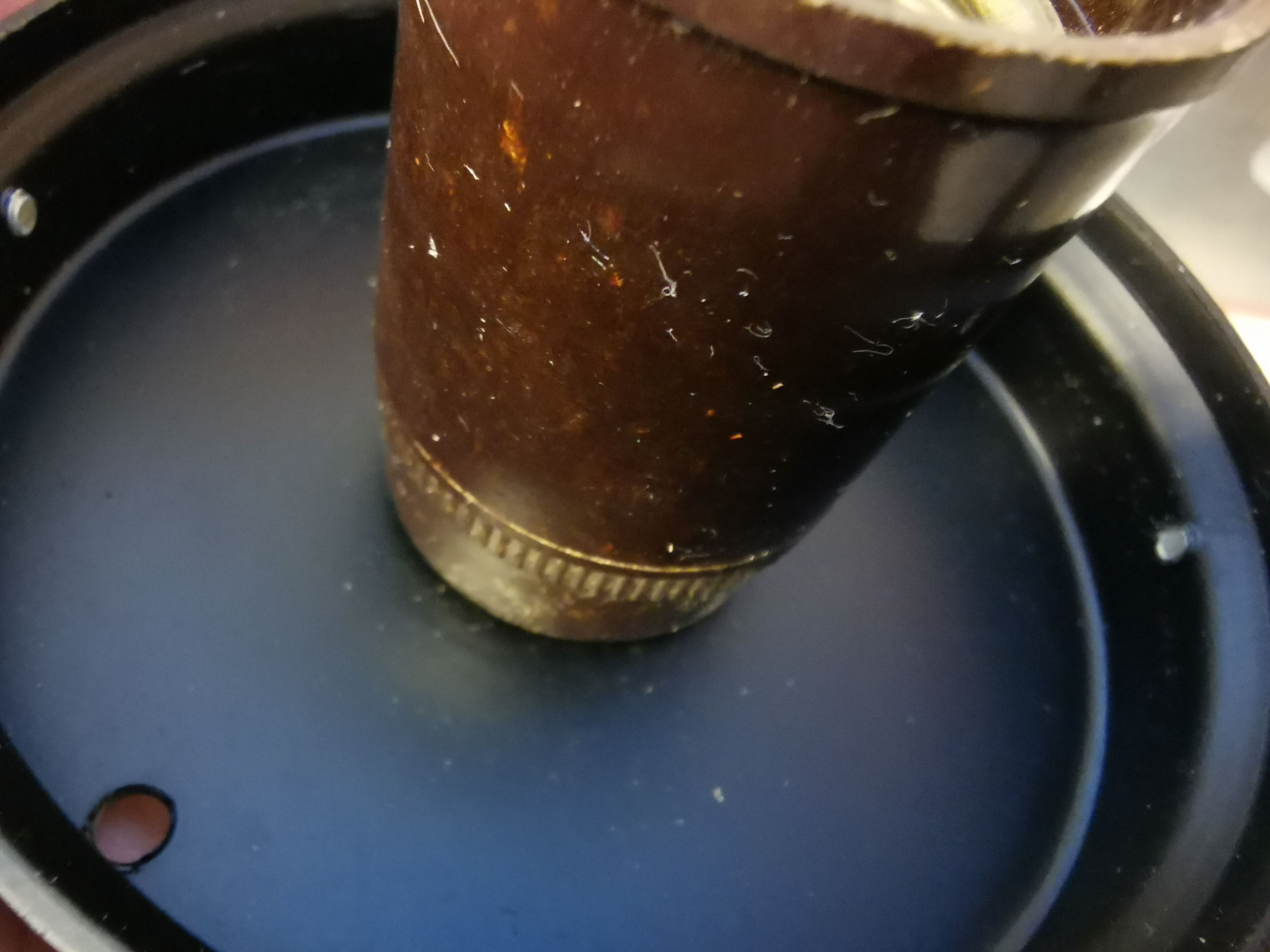 Wall light, made in black metal frame with olive green glass shade