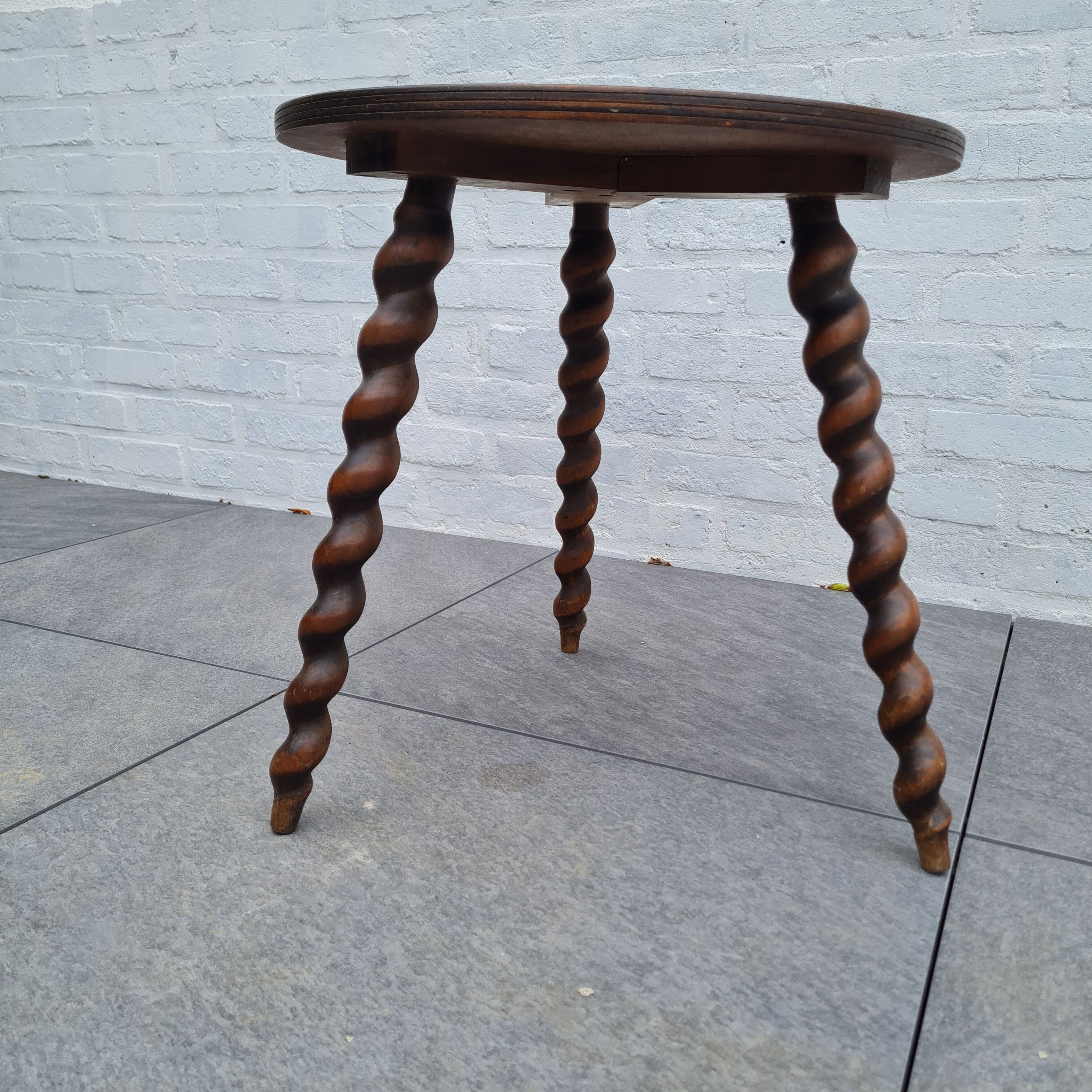 Wooden coffee table twisted tripod base