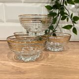 Set of 4 glasses of golden border champagne