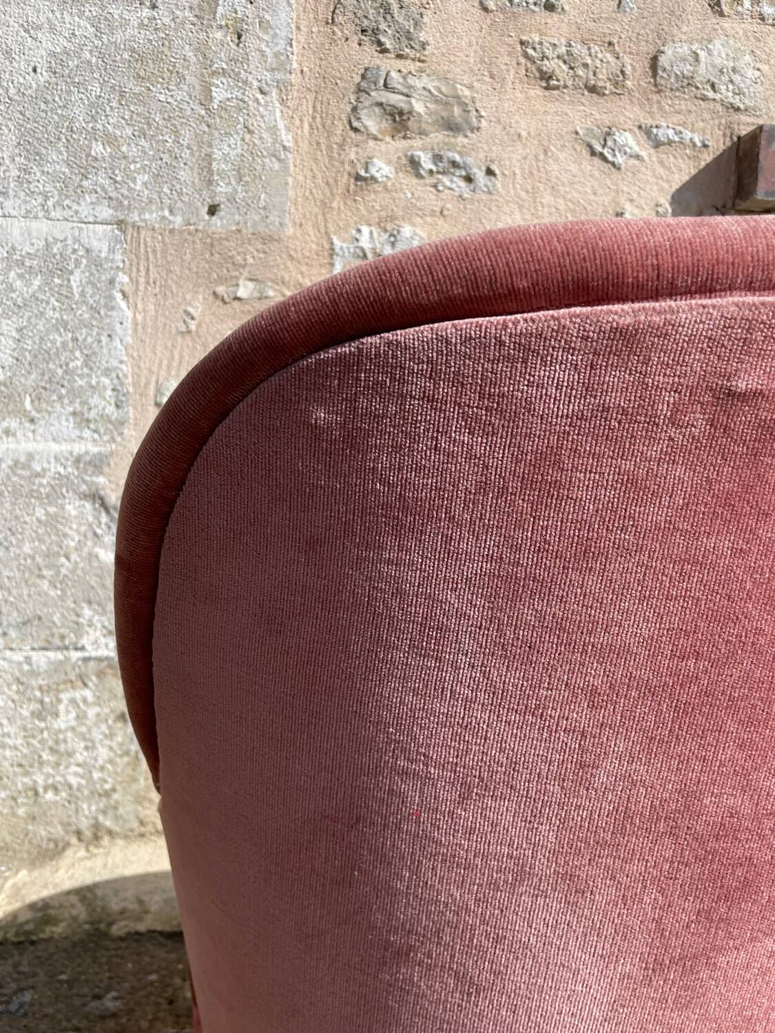 Pink velvet armchair