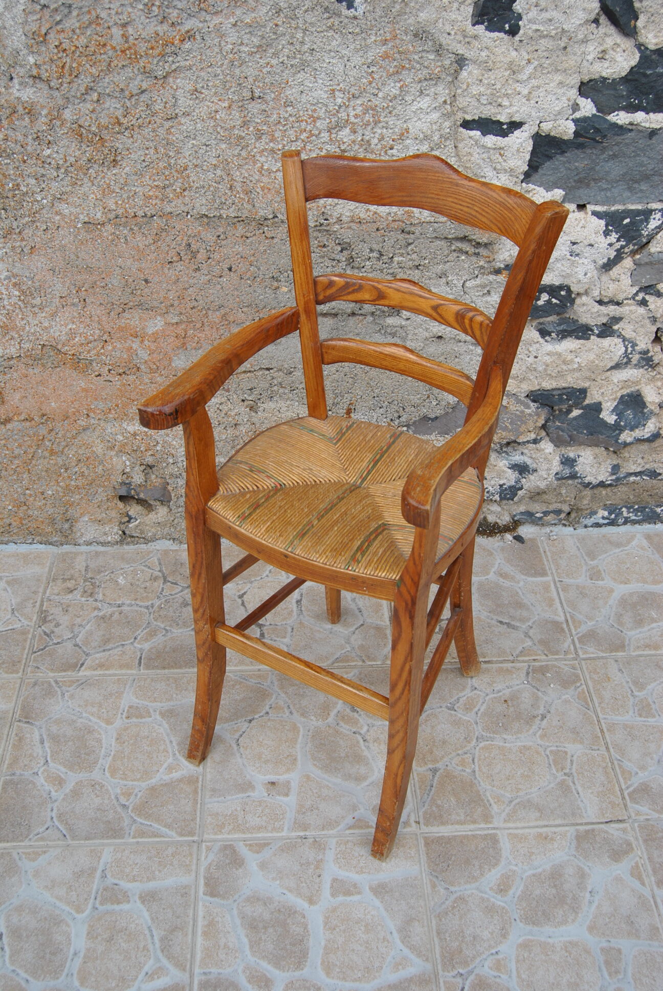 Wooden children's high chair and mulched seat