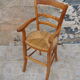 Wooden children's high chair and mulched seat