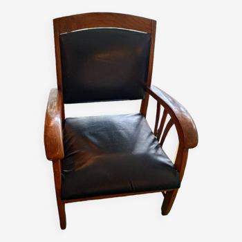 Colonial style wooden armchair