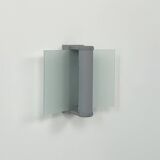 Vintage wall light, grey lacquered metal and frosted curved glass, France, 1980.