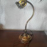 Brass articulated piano or desk lamp