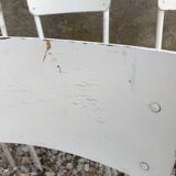 10 white school chairs