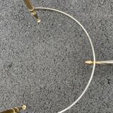 Coffee table in gilded brass and veined green marble