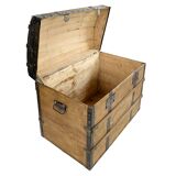 Wooden transport trunk with steel reinforcements