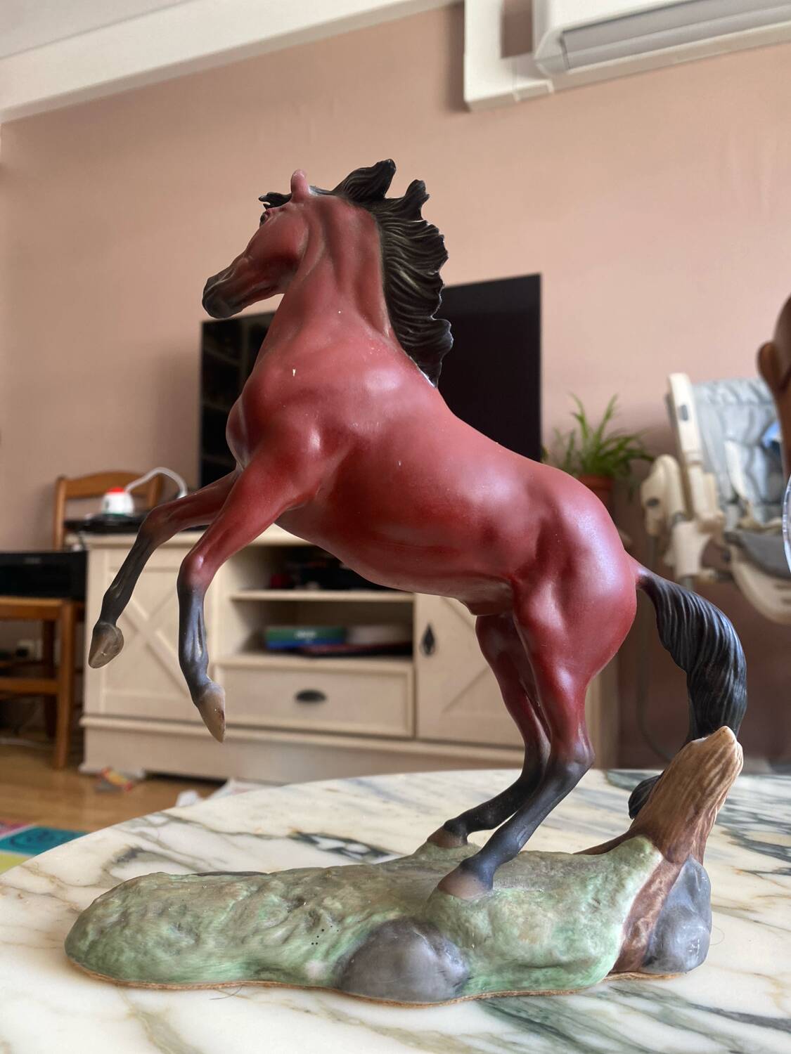 Porcelain horse statue (the red pony)