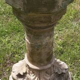 Holy water font on stone column (17th century)