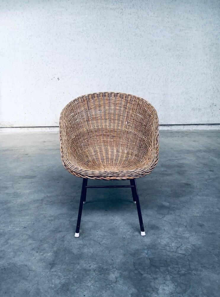 Wicker lounge chair in the style of Dirk Van Sliedregt for Rohé Noordwolde, Netherlands, 1960s.