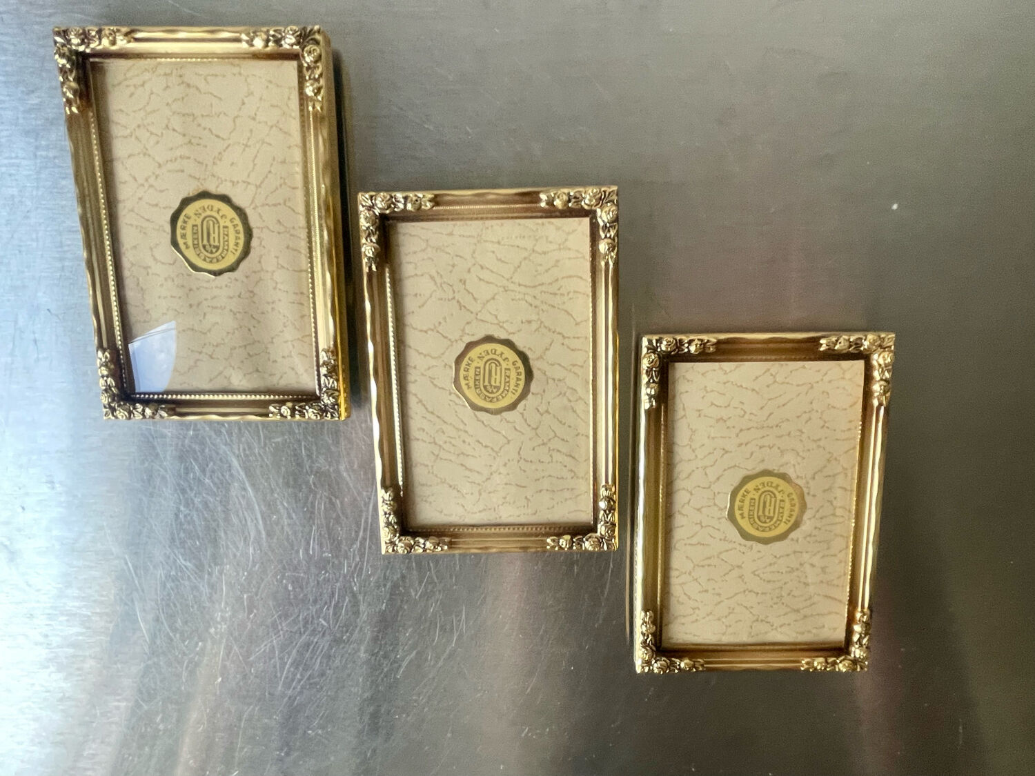 Set of 3 vintage identical gold colored metal picture frames convex glass