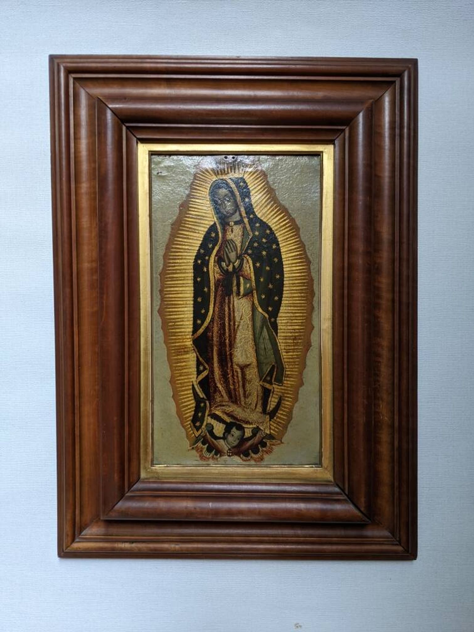 Religious tableau of the Virgin, painting on metal with a handcrafted wooden frame.