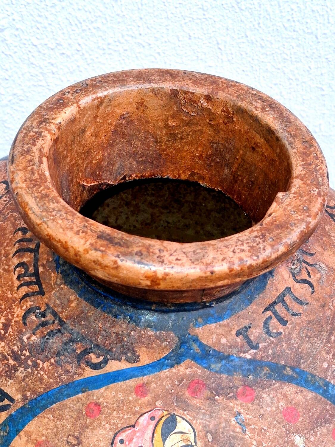 Terracotta vase, decoration of Persian figures.