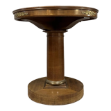 Art Deco pedestal table in mahogany and gilded bronzes around 1920