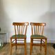 Pair of bistro chairs in light curved wood and green seat 1950s