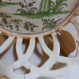 Old woven and openwork earthenware basket, with painted decoration in the center, probably 18th century