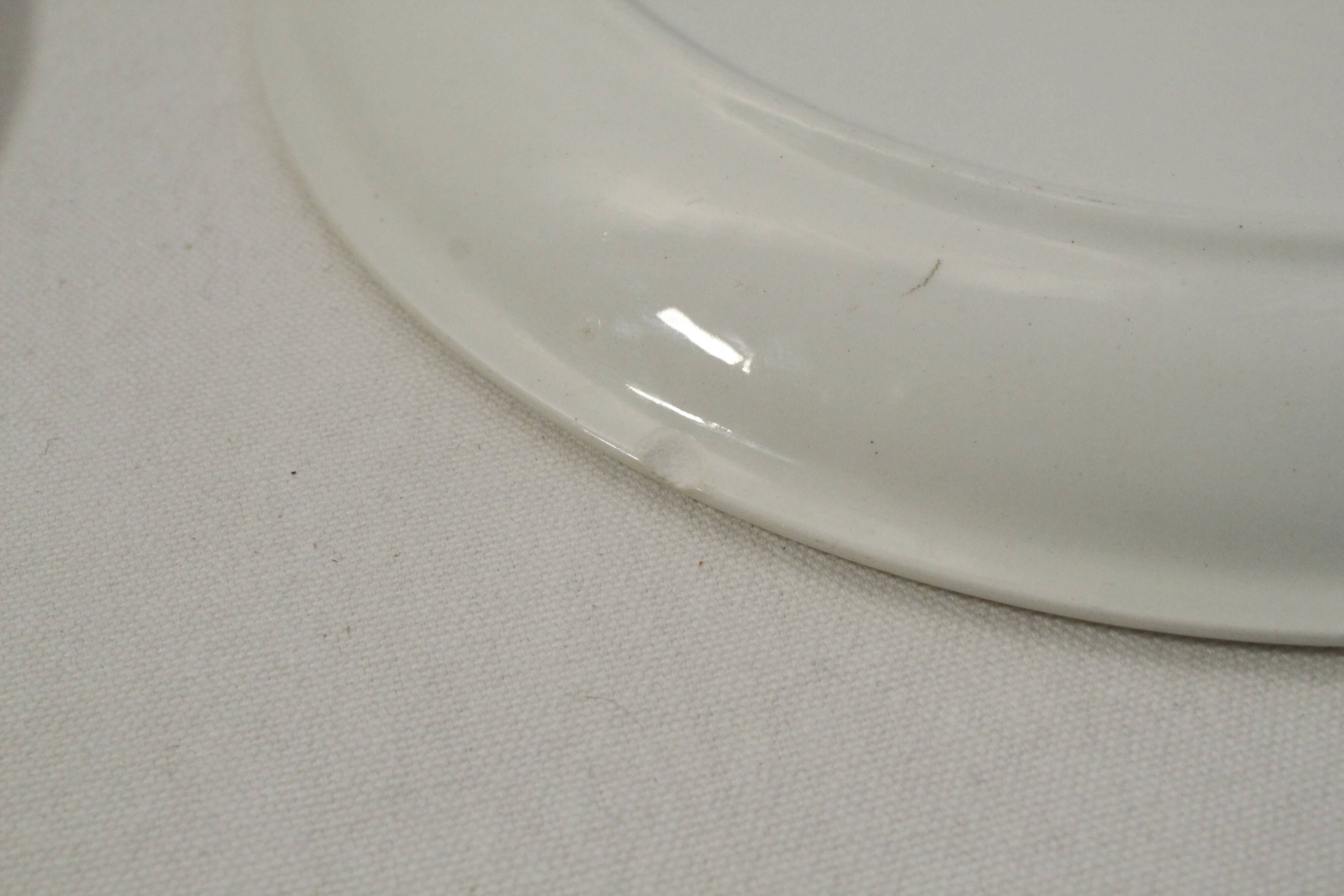 Set of 3 mismatched flat plates - red/burgundy decorations - deer and hare