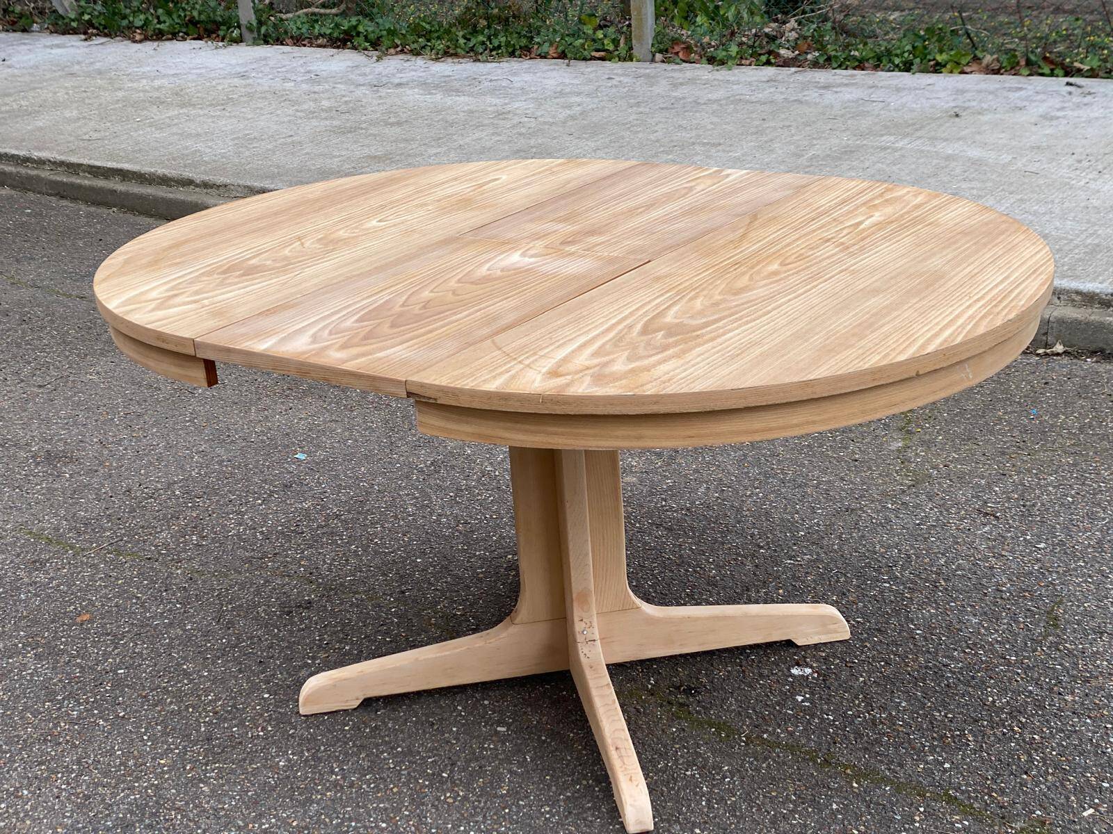 Scandinavian Baumann round extendable dining table with central leg, 115cm.