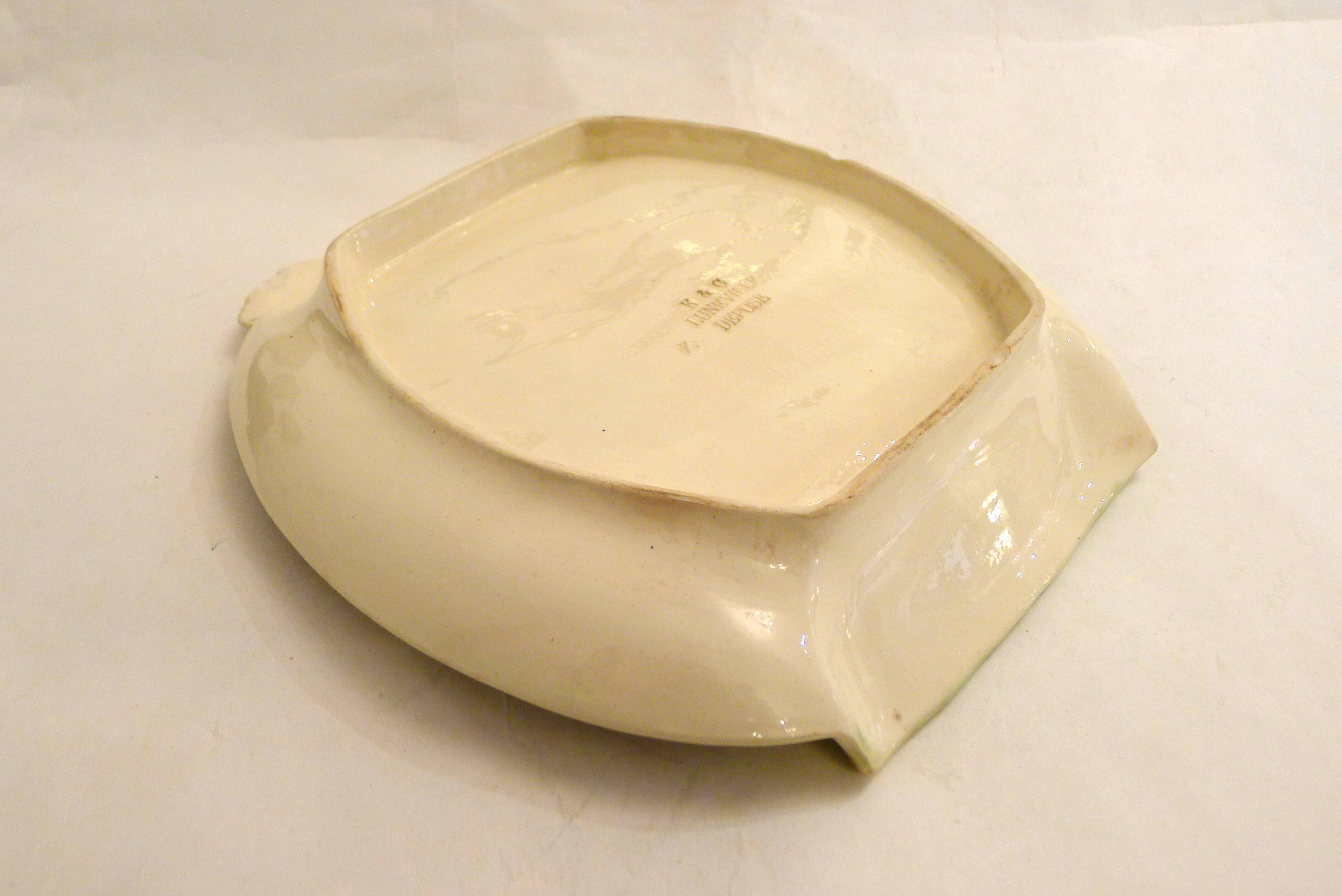 Mid-century asparagus dish, in Keller & Guérin barbotine earthenware.