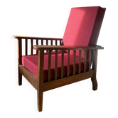 Morris chair with wooden frame and burgundy cushions.
