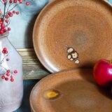 Quatre assiettes de potier en grès émaillé vintages