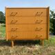 Commode 4 tiroirs vintage en aggloméré plaqué véritable bois