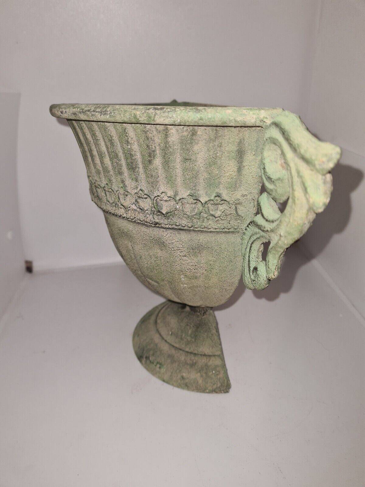 Medici wall vase in patinated iron