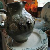 Pitcher decorated with bunches of grapes